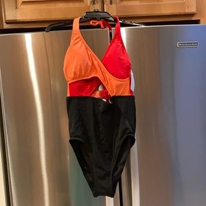 Red, orange & black wrap front one piece.